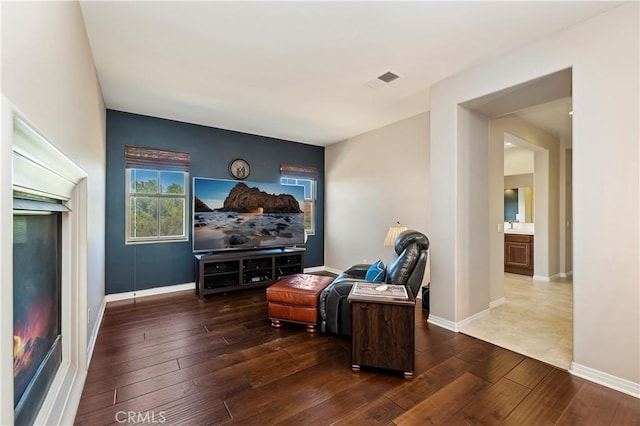 living area with dark wood-type flooring