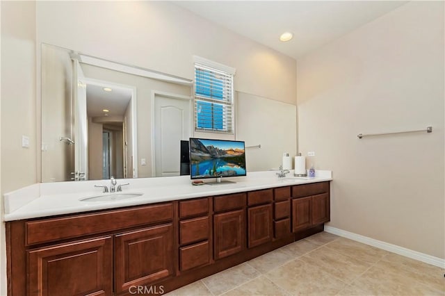 bathroom with vanity and tile patterned floors