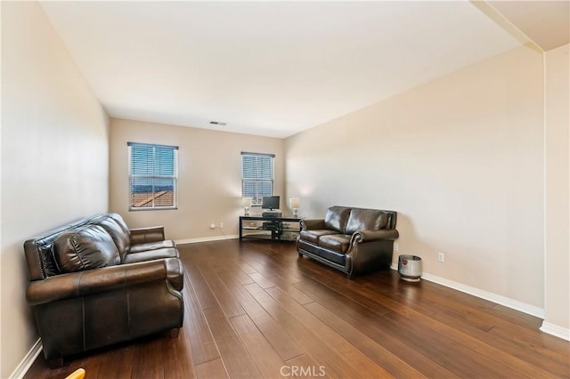 living room featuring dark hardwood / wood-style flooring