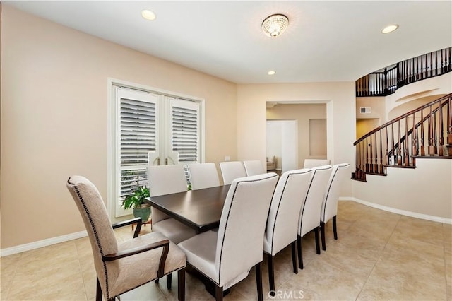 dining area with light tile patterned flooring