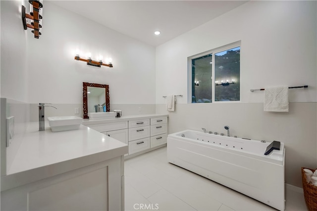 bathroom with vanity and a bathtub