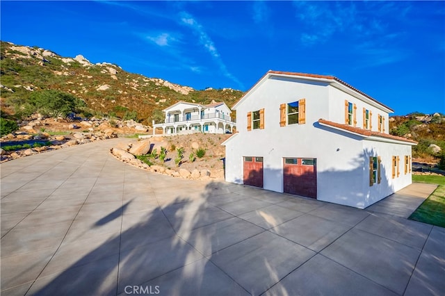 exterior space featuring a mountain view