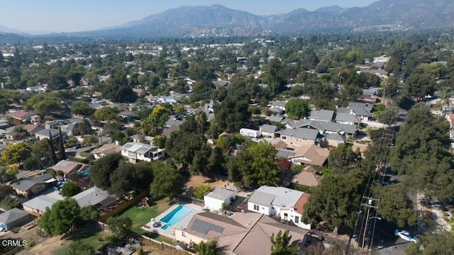 drone / aerial view featuring a mountain view