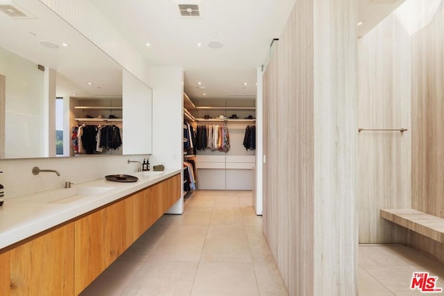 bathroom featuring vanity and tile patterned flooring