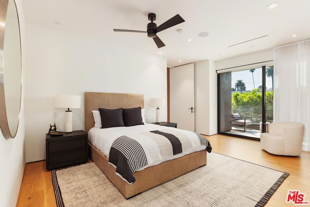 bedroom with access to outside, light hardwood / wood-style floors, and ceiling fan