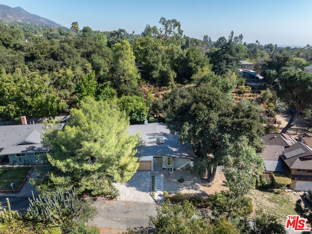 birds eye view of property with a mountain view