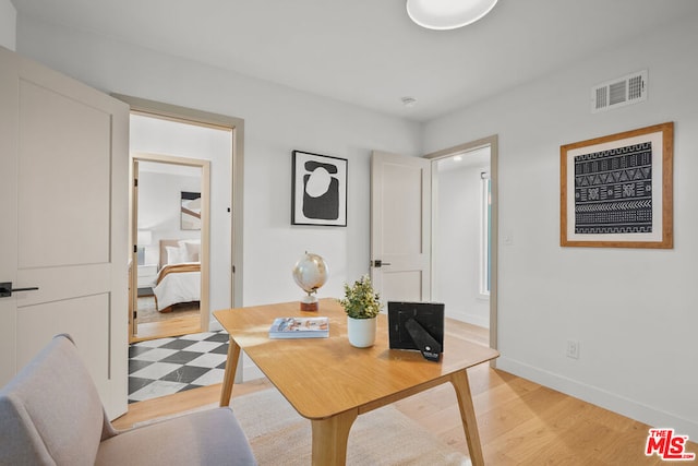 home office featuring light hardwood / wood-style floors