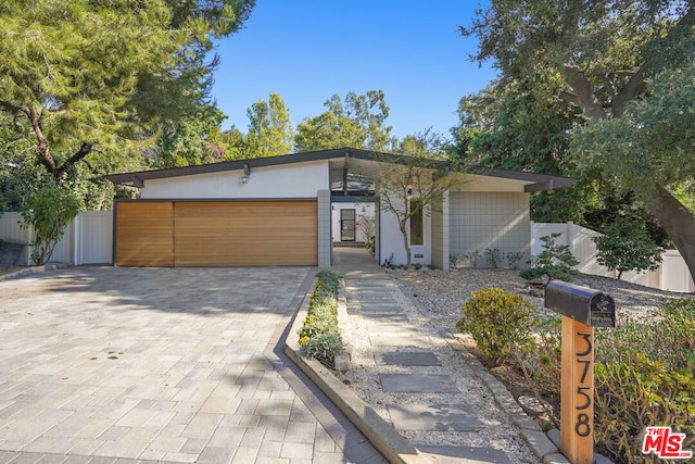 view of front of home featuring a garage