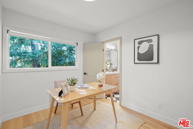 office area featuring light hardwood / wood-style flooring