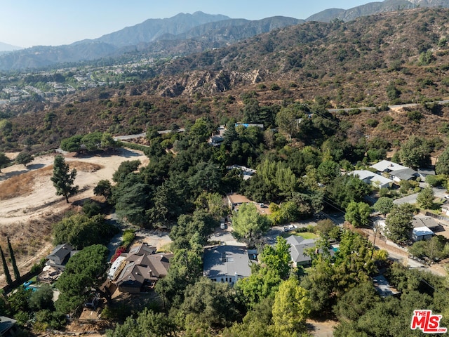 drone / aerial view featuring a mountain view