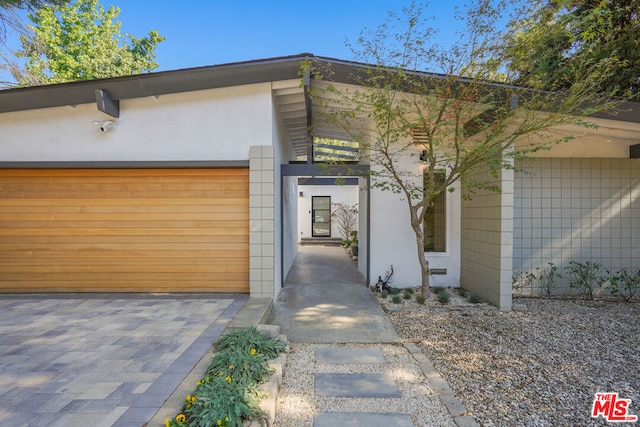 view of front of property with a garage