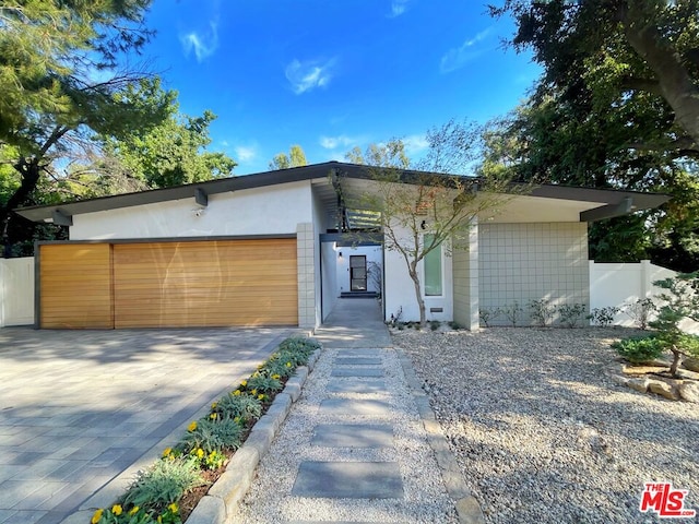 view of front of property featuring a garage