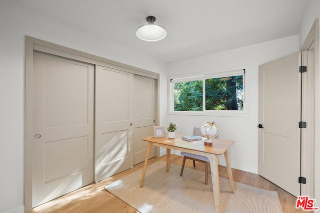 home office featuring light hardwood / wood-style flooring