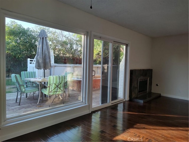 doorway to outside featuring dark hardwood / wood-style flooring