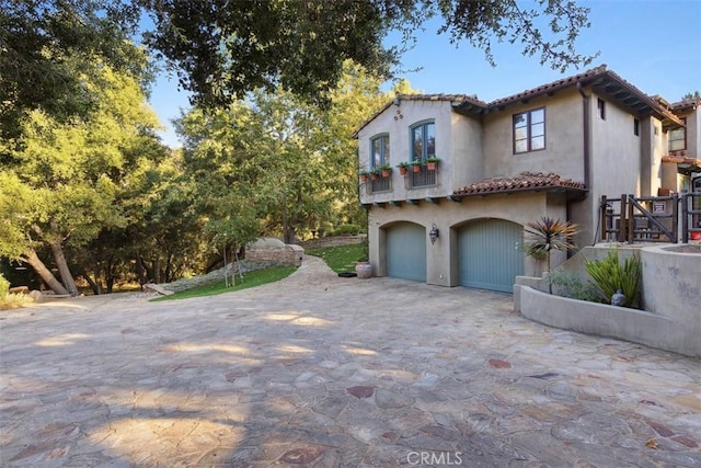 view of property exterior with a garage