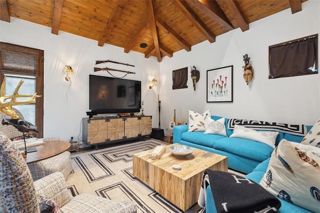 living room featuring lofted ceiling with beams and wooden ceiling