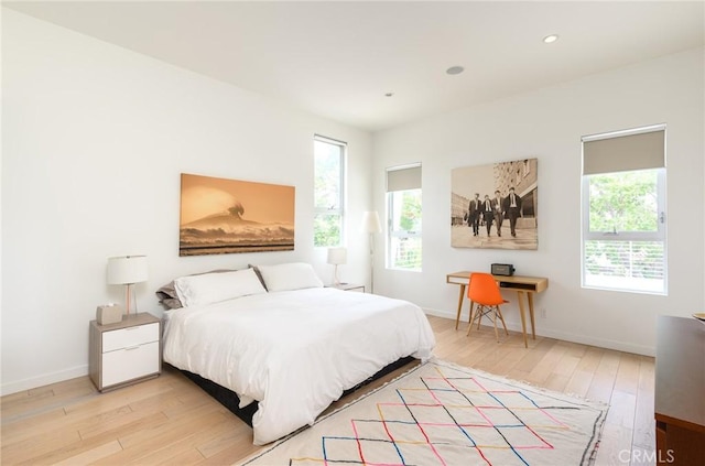 bedroom with light wood-type flooring