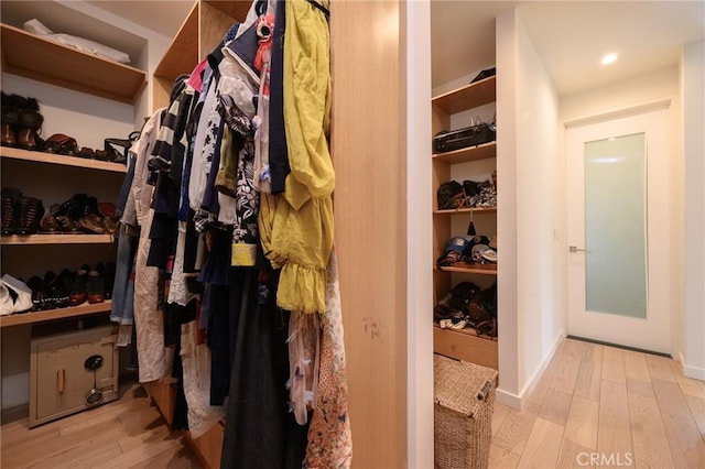 spacious closet with wood finished floors