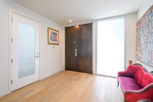 entrance foyer with light wood-type flooring and recessed lighting