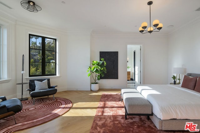 bedroom with crown molding, wood-type flooring, and a notable chandelier