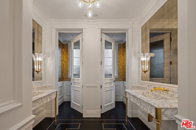 bathroom with crown molding and wood-type flooring