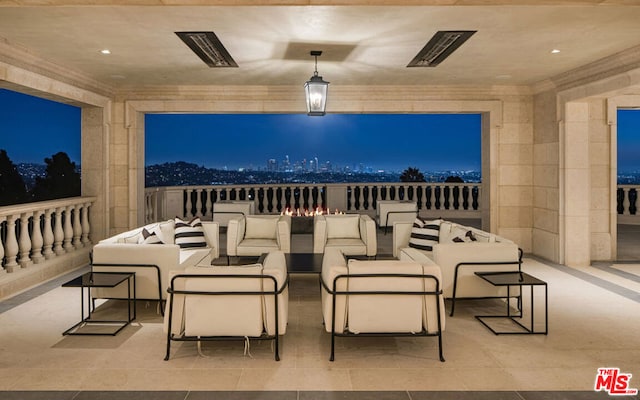 patio at night with an outdoor living space