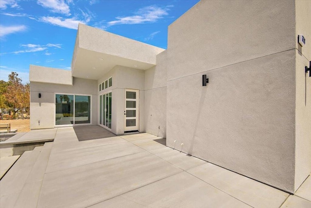 rear view of house featuring a patio area