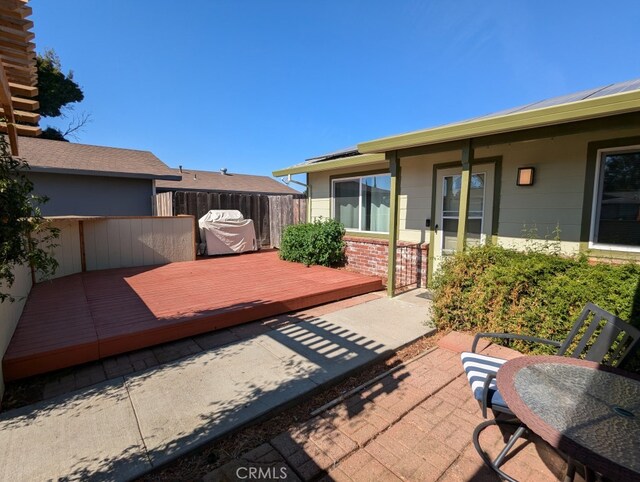 view of patio / terrace featuring a wooden deck