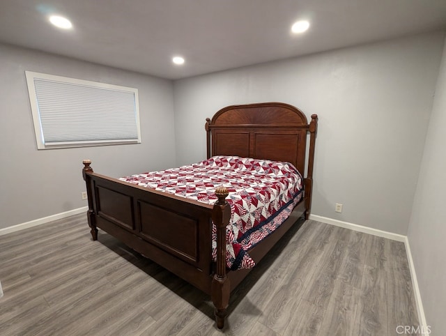 bedroom featuring hardwood / wood-style floors