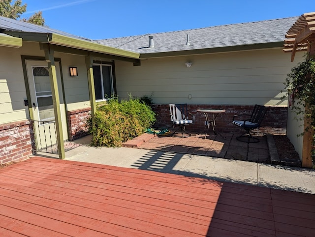 deck featuring a patio area