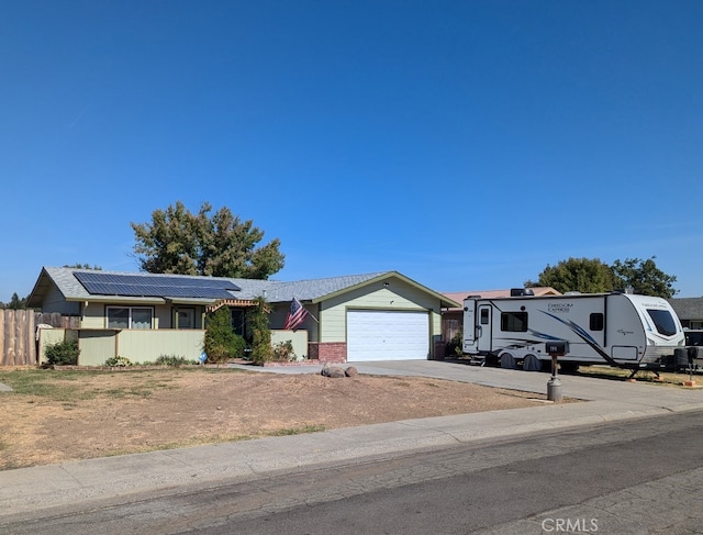 single story home with a garage