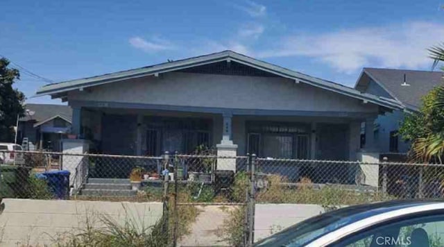 bungalow featuring covered porch