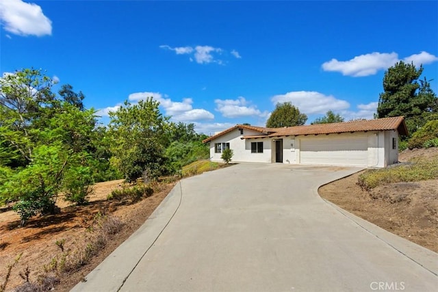 view of front of house with a garage