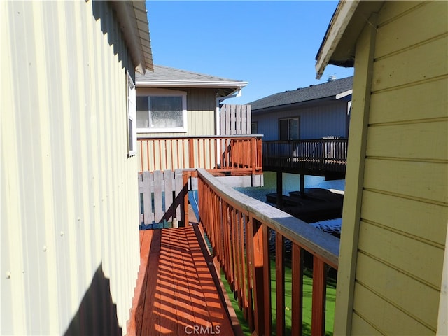 wooden balcony featuring a wooden deck