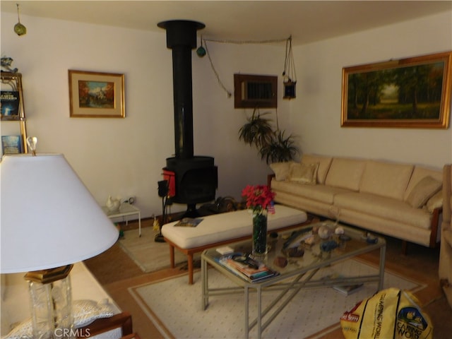 living room with a wood stove