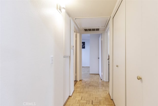 corridor with light parquet flooring