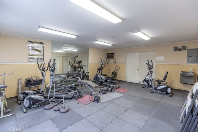 exercise room featuring electric panel