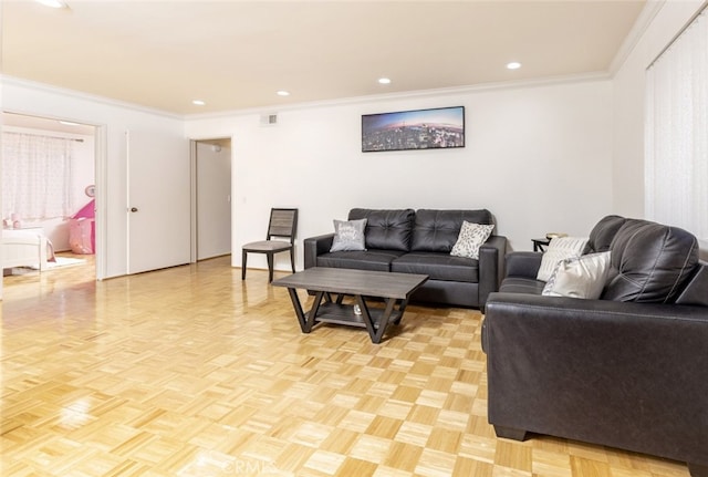 living room featuring light parquet flooring and ornamental molding