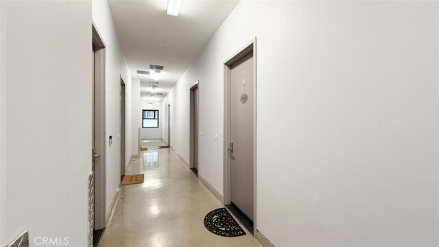 433 Pine Ave Unit 304, Long Beach, CA 90802 - hall with baseboards and finished concrete flooring