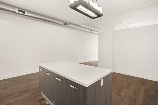 433 Pine Ave Unit 304, Long Beach, CA 90802 - walk in closet featuring dark wood-style flooring