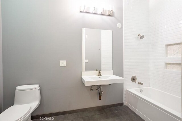 433 Pine Ave Unit 304, Long Beach, CA 90802 - bathroom with tile patterned flooring, toilet, baseboards, and shower / tub combination