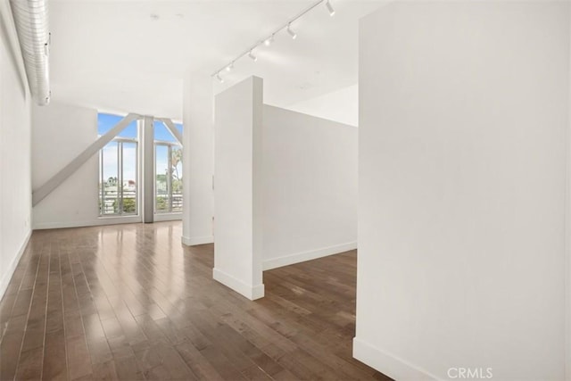 433 Pine Ave Unit 304, Long Beach, CA 90802 - bonus room featuring baseboards and wood finished floors