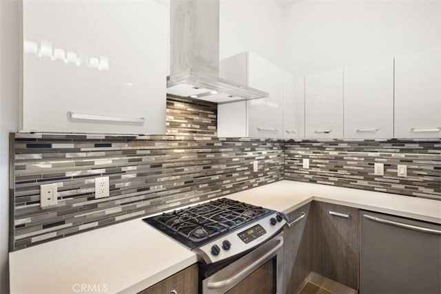 433 Pine Ave Unit 304, Long Beach, CA 90802 - kitchen featuring stainless steel appliances, wall chimney exhaust hood, and light countertops