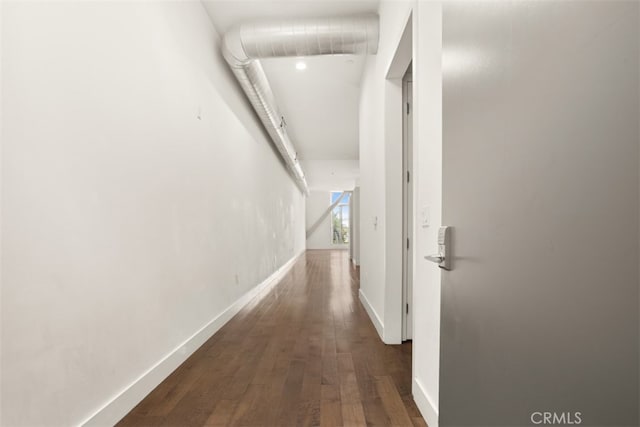 hallway featuring dark hardwood / wood-style floors