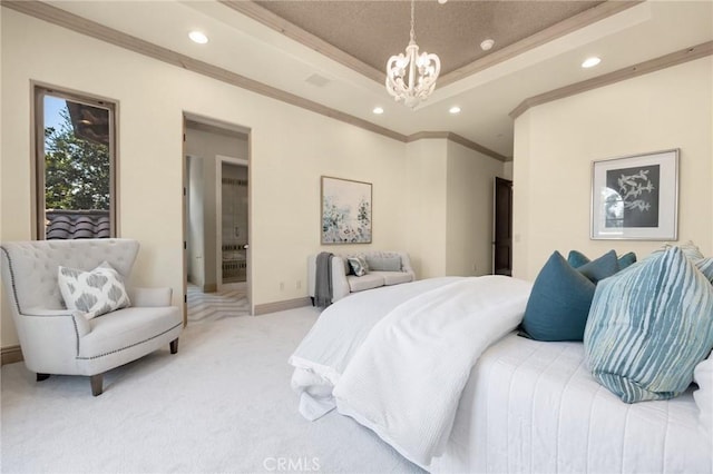 carpeted bedroom featuring a tray ceiling, crown molding, and an inviting chandelier