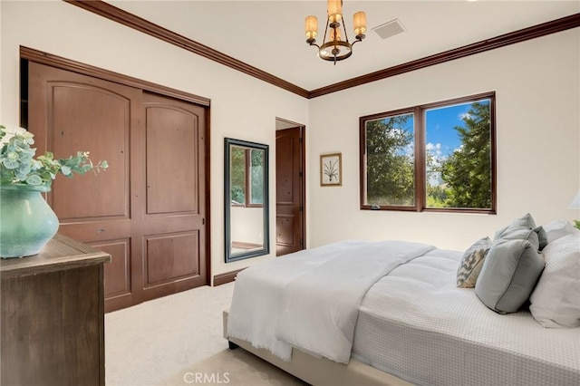 bedroom featuring crown molding, carpet floors, and a notable chandelier