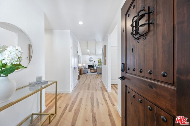 hallway featuring light hardwood / wood-style flooring