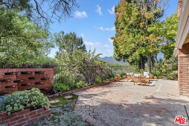 view of patio with a mountain view