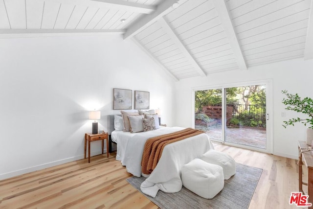 bedroom with access to exterior, light wood-type flooring, high vaulted ceiling, and beamed ceiling