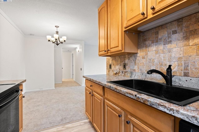 kitchen with sink, ornamental molding, a chandelier, decorative backsplash, and light wood-type flooring